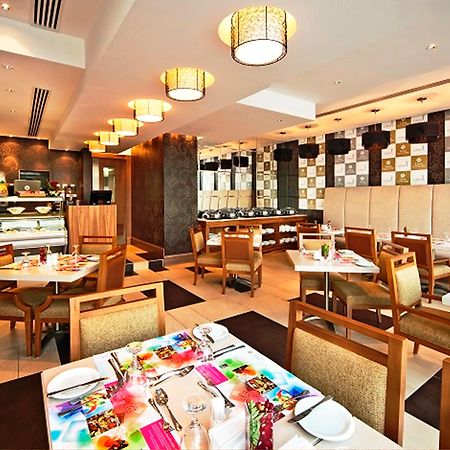 Oaks Liwa Executive Suites Abu Dabi Restoran fotoğraf